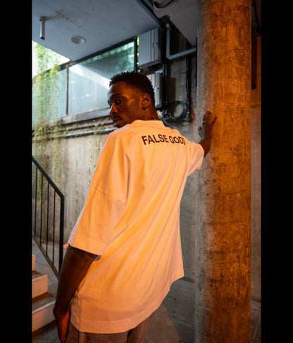 Male model wearing Men's Bold Spirit Black Oversized T-Shirt - Back view