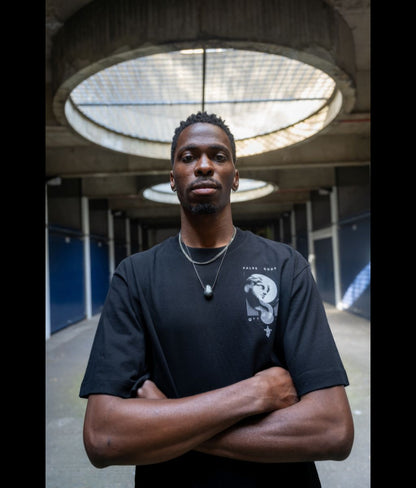 Male model wearing Full Moon Black Heavyweight T-Shirt - Front view