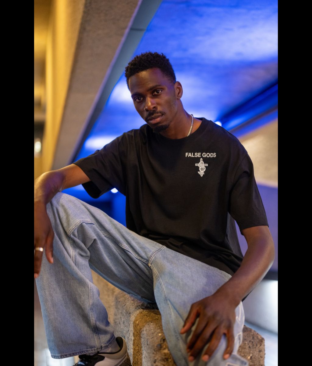 Male model wearing Men's Bold Spirit T-Shirt in black - Front view